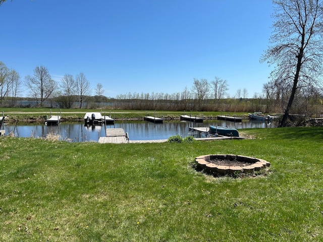 39872 Moose Ln, Wahkon, MN 56386 - water view featuring an outdoor fire pit and a dock