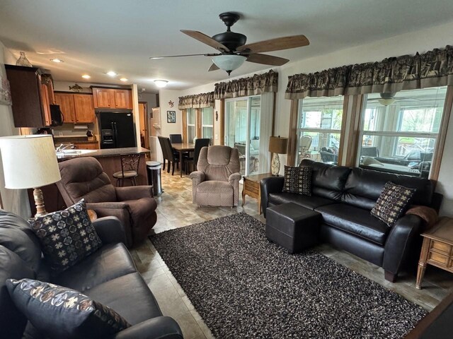 39872 Moose Ln, Wahkon, MN 56386 - living area featuring ceiling fan and recessed lighting