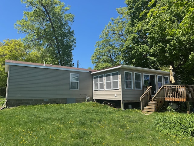 39872 Moose Ln, Wahkon, MN 56386 - rear view of property with a wooden deck, a yard, and stairs