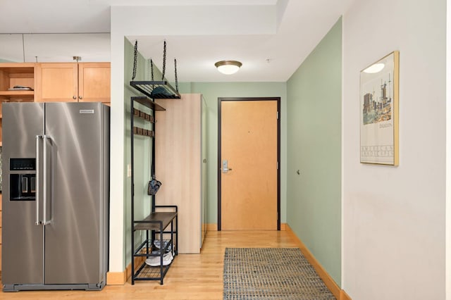 4500 Chicago Ave Unit 311, Minneapolis, MN 55407 - kitchen featuring high quality fridge, light wood-style flooring, open shelves, and baseboards