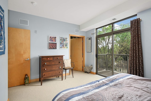 4500 Chicago Ave Unit 311, Minneapolis, MN 55407 - bedroom with access to outside, carpet floors, and baseboards