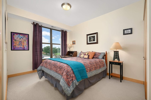 4500 Chicago Ave Unit 311, Minneapolis, MN 55407 - bedroom with baseboards and carpet floors