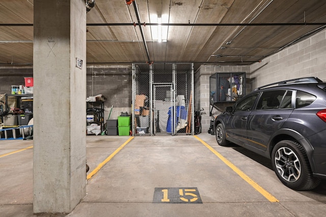 4500 Chicago Ave Unit 311, Minneapolis, MN 55407 - parking deck featuring concrete block wall