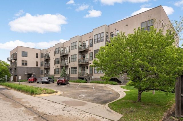 4500 Chicago Ave Unit 311, Minneapolis, MN 55407 - view of apartment building / complex with uncovered parking