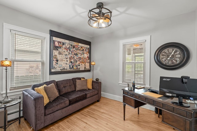 3812 Elliot Ave, Minneapolis, MN 55407 - office featuring light wood-type flooring, a baseboard radiator, baseboards, and ceiling fan
