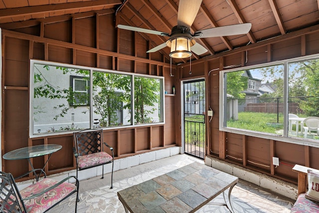3812 Elliot Ave, Minneapolis, MN 55407 - unfurnished sunroom featuring vaulted ceiling and a ceiling fan