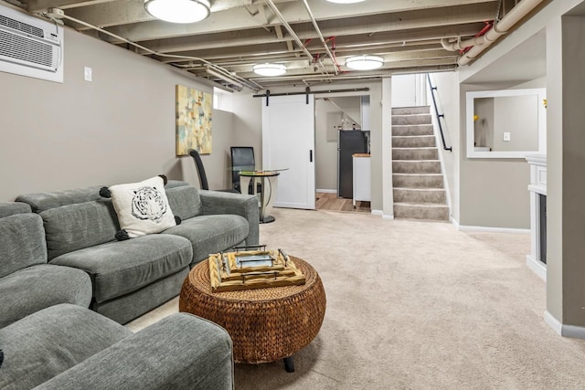 3812 Elliot Ave, Minneapolis, MN 55407 - living room with carpet flooring, stairs, a wall mounted AC, and baseboards