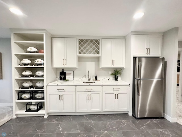 3340 2nd St E, West Fargo, ND 58078 - kitchen with freestanding refrigerator, a sink, dark marble finish flooring, open shelves, and recessed lighting