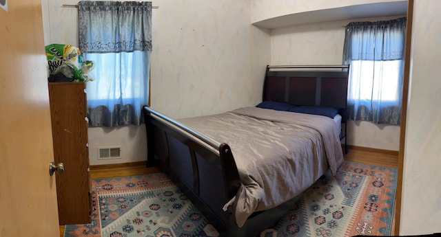 1272 Burke Ave E, Maplewood, MN 55109 - bedroom featuring baseboards