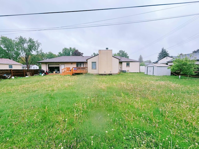 1272 Burke Ave E, Maplewood, MN 55109 - back of house featuring a deck and a chimney