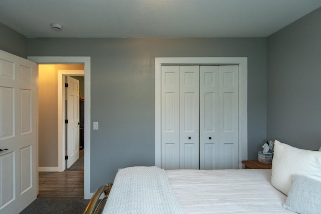 7903 Long Lake Bay Rd, Brainerd, MN 56401 - bedroom featuring a closet, baseboards, and wood finished floors