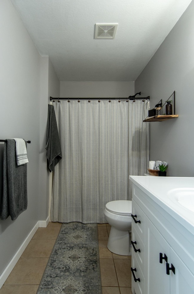 7903 Long Lake Bay Rd, Brainerd, MN 56401 - full bath with tile patterned flooring, vanity, toilet, and baseboards