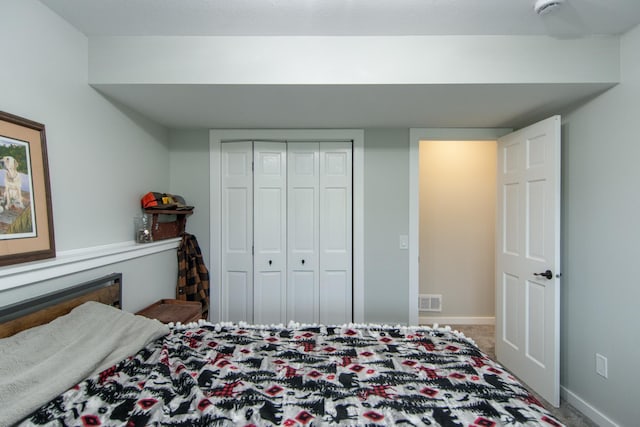 7903 Long Lake Bay Rd, Brainerd, MN 56401 - bedroom featuring carpet floors, a closet, and baseboards