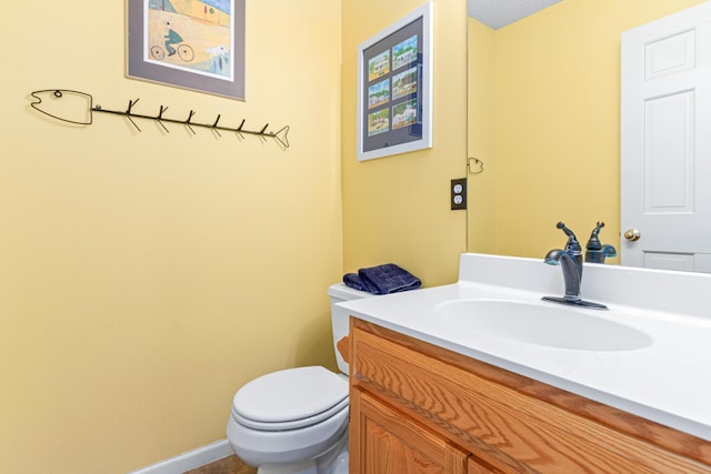 2195 Bayview Pl, Orono, MN 55391 - half bathroom featuring vanity, toilet, and baseboards