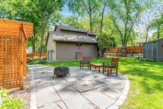 2195 Bayview Pl, Orono, MN 55391 - view of patio with a fire pit