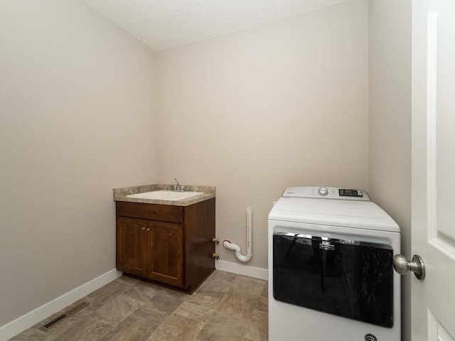 967 206th Ave NW, Oak Grove, MN 55011 - washroom with washer / clothes dryer, baseboards, and cabinet space
