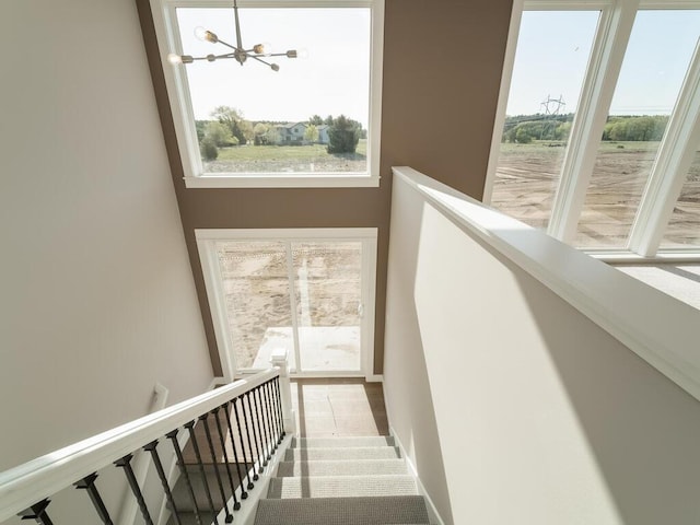 967 206th Ave NW, Oak Grove, MN 55011 - staircase featuring a chandelier