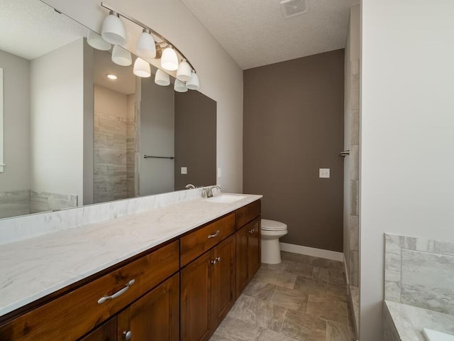 967 206th Ave NW, Oak Grove, MN 55011 - full bathroom with vanity, toilet, and baseboards