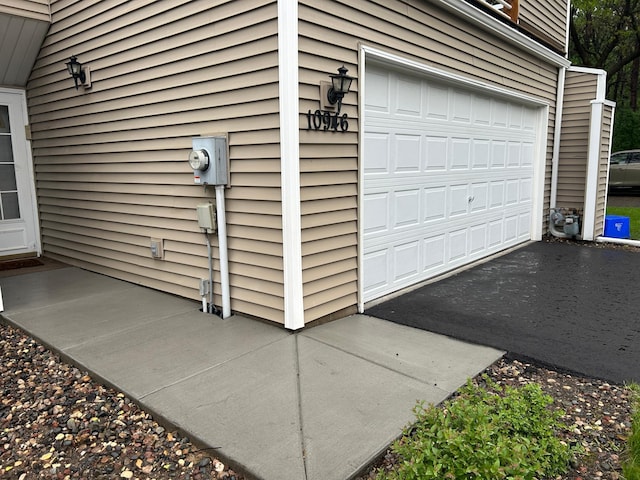 10946 Johnson St NE, Blaine, MN 55434 - garage with driveway