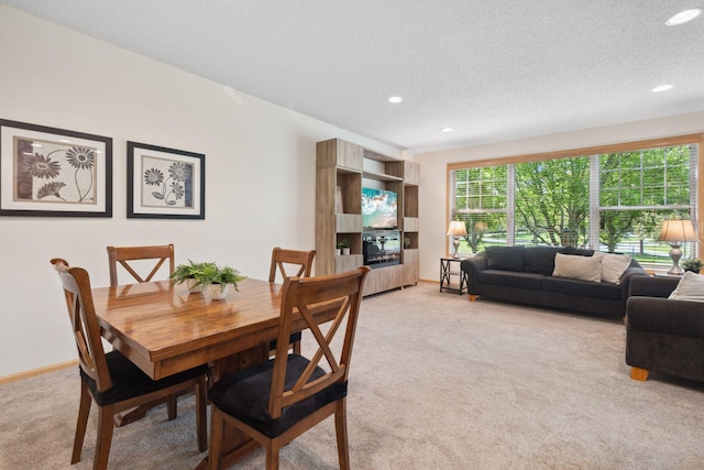 2658 133rd St W, Rosemount, MN 55068 - dining area featuring light colored carpet, recessed lighting, and a textured ceiling