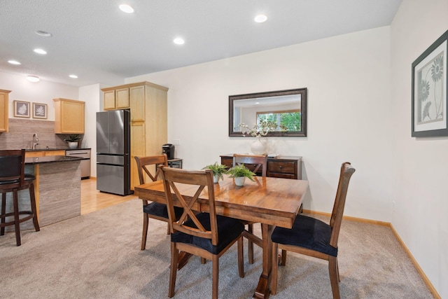 2658 133rd St W, Rosemount, MN 55068 - dining area with light carpet, recessed lighting, and baseboards