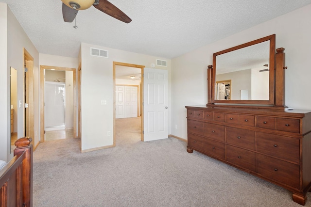 2658 133rd St W, Rosemount, MN 55068 - bedroom featuring light colored carpet, a textured ceiling, a ceiling fan, and baseboards