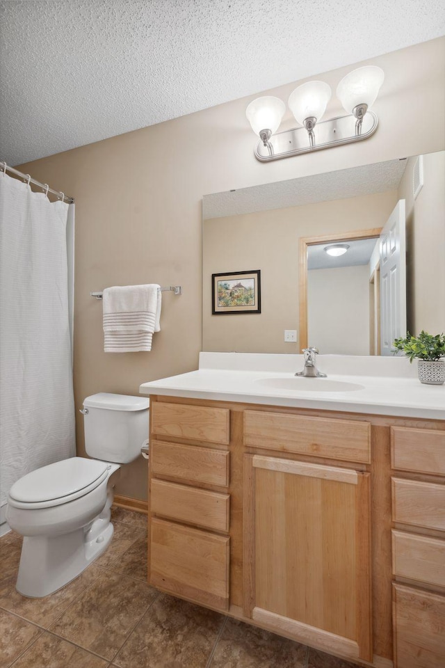 2658 133rd St W, Rosemount, MN 55068 - full bath with vanity, toilet, a textured ceiling, tile patterned floors, and curtained shower