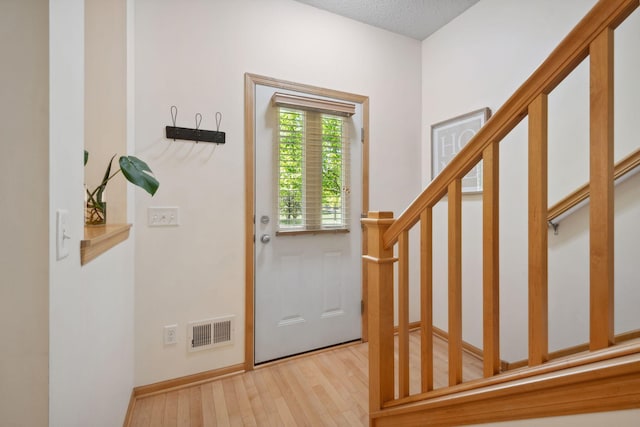 2658 133rd St W, Rosemount, MN 55068 - entryway featuring wood finished floors and stairway