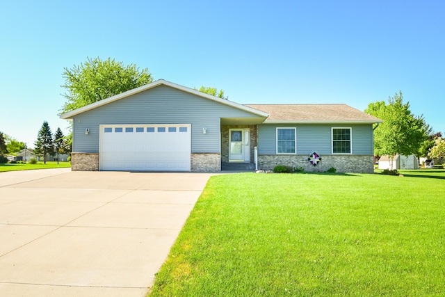 625 7th St NW, Richmond, MN 56368 - view of front of property with brick siding, a front yard, a garage, and driveway