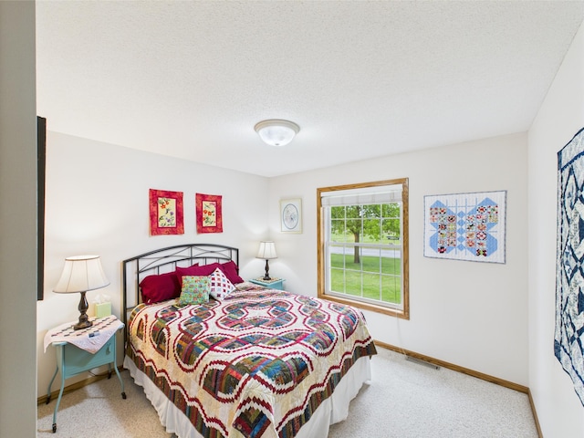 625 7th St NW, Richmond, MN 56368 - carpeted bedroom featuring baseboards