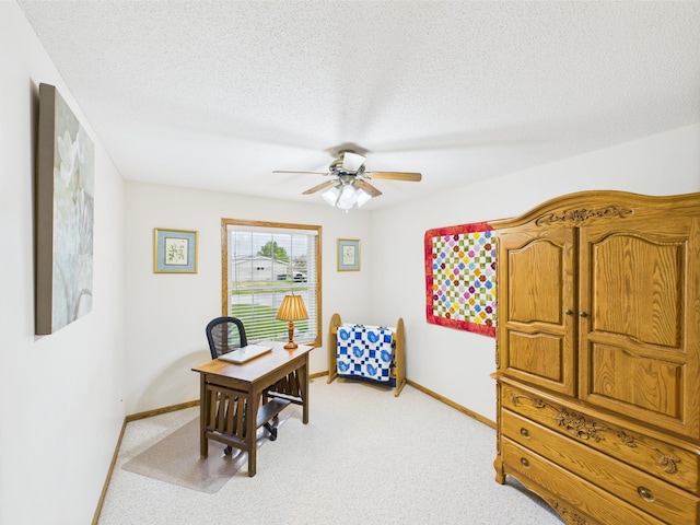 625 7th St NW, Richmond, MN 56368 - office area with ceiling fan, light colored carpet, baseboards, and a textured ceiling