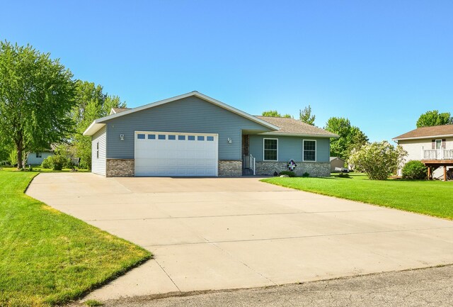 625 7th St NW, Richmond, MN 56368 - single story home with a garage, a front yard, and concrete driveway