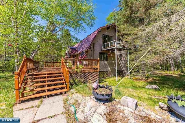 3240 Breezy Point Rd, Tower, MN 55790 - back of house featuring a deck and stairway