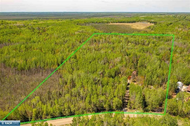 3240 Breezy Point Rd, Tower, MN 55790 - aerial view of property's location featuring a heavily wooded area and property boundaries highlighted