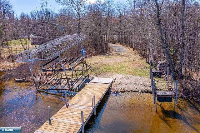 3240 Breezy Point Rd, Tower, MN 55790 - dock featuring a water view and a wooded view