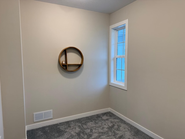105 7th St, Hoffman, MN 56339 - unfurnished room with baseboards and dark colored carpet