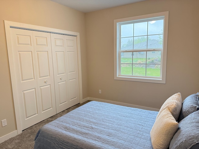 105 7th St, Hoffman, MN 56339 - bedroom featuring carpet floors, baseboards, and a closet