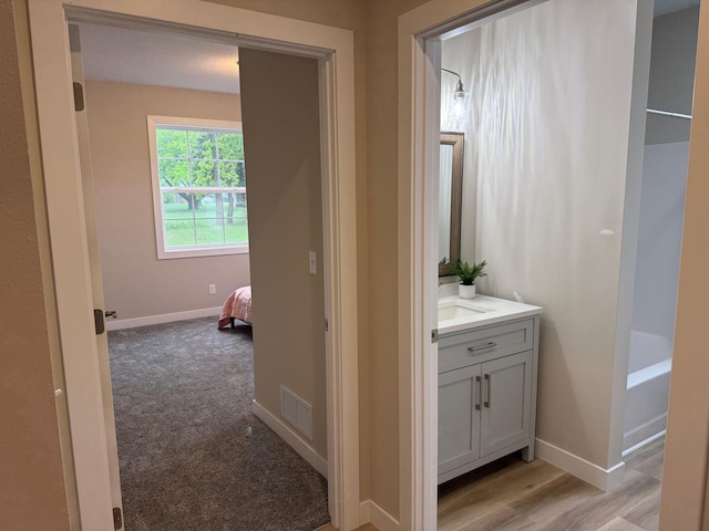 105 7th St, Hoffman, MN 56339 - full bath featuring baseboards and vanity