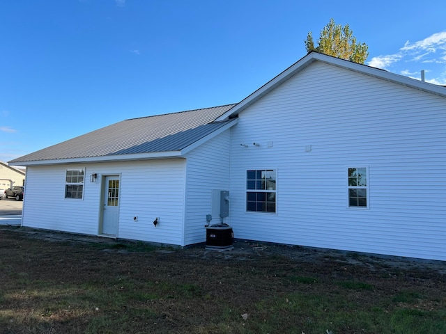 105 7th St, Hoffman, MN 56339 - rear view of property featuring metal roof and cooling unit
