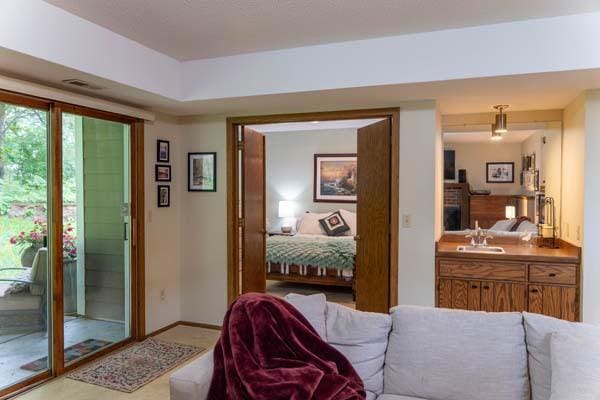 9826 Brighton Ln, Eden Prairie, MN 55347 - living area featuring baseboards