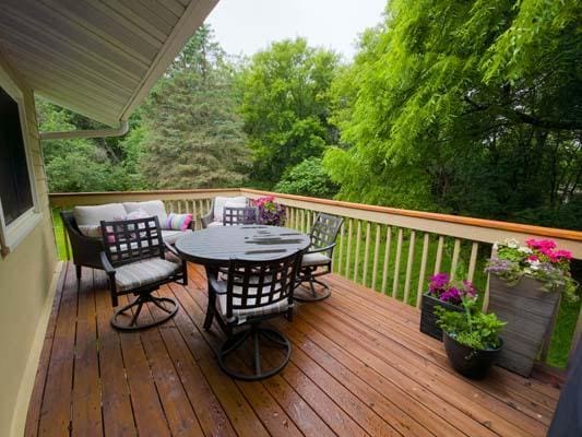 9826 Brighton Ln, Eden Prairie, MN 55347 - wooden terrace featuring outdoor dining area and outdoor lounge area