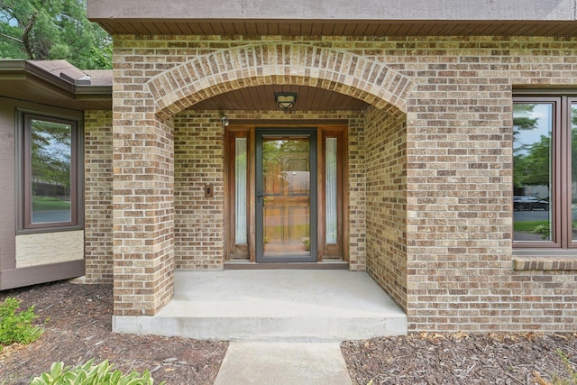 669 Lake Pine Dr, Shoreview, MN 55126 - doorway to property with brick siding
