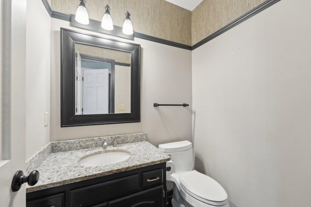 669 Lake Pine Dr, Shoreview, MN 55126 - half bathroom featuring vanity and toilet