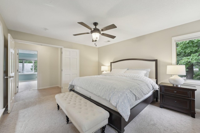 669 Lake Pine Dr, Shoreview, MN 55126 - bedroom with carpet floors, baseboards, and a ceiling fan