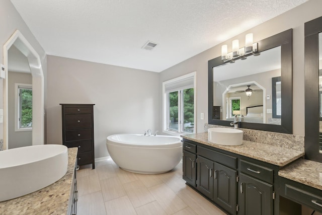 669 Lake Pine Dr, Shoreview, MN 55126 - full bath with a freestanding tub and vanity
