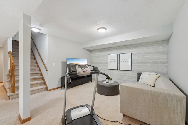 669 Lake Pine Dr, Shoreview, MN 55126 - exercise area featuring a textured ceiling, carpet, baseboards, and an accent wall