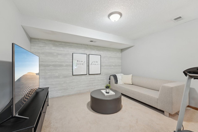 669 Lake Pine Dr, Shoreview, MN 55126 - carpeted living room with a textured ceiling
