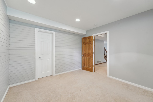 669 Lake Pine Dr, Shoreview, MN 55126 - unfurnished bedroom with light colored carpet, baseboards, recessed lighting, and a closet