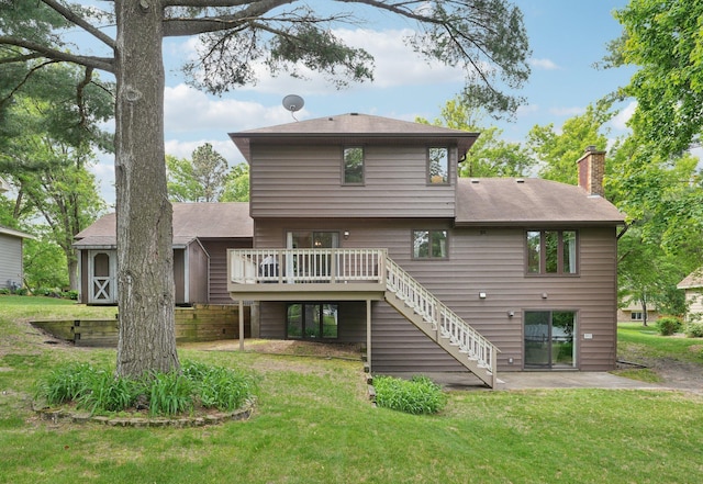 669 Lake Pine Dr, Shoreview, MN 55126 - back of property with stairs, a deck, a chimney, and a yard