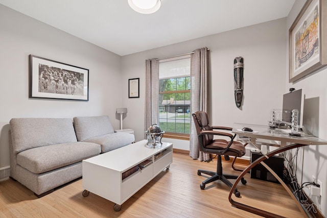 18201 Kathleene Dr, Minnetonka, MN 55345 - home office with light wood-type flooring and baseboards